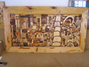 Mozaika Maják – lepení kousků různého dřeva zapadajícího k sobě.